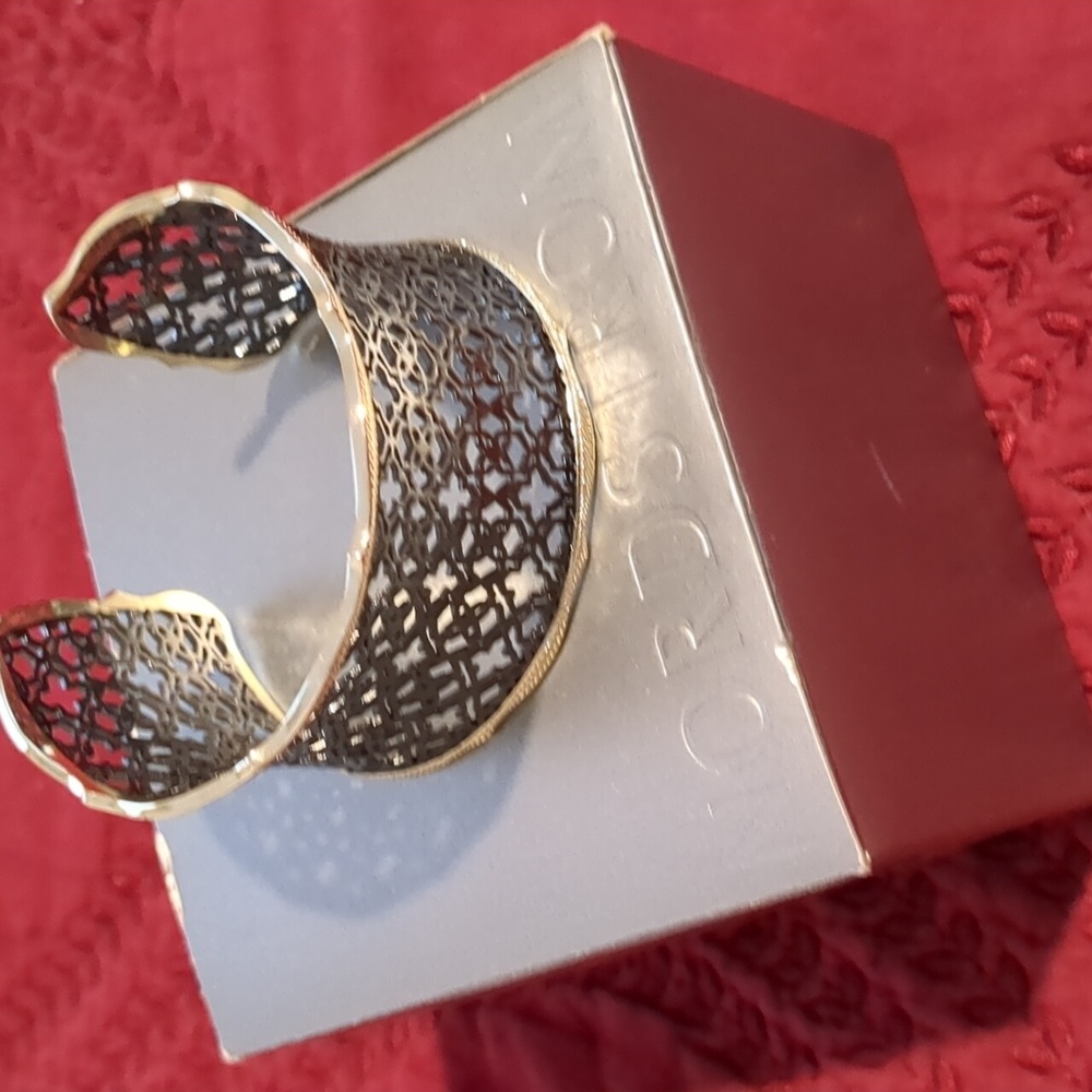 Metallic two tone cuff bracelet from Kendra Scott. Sells for $80.